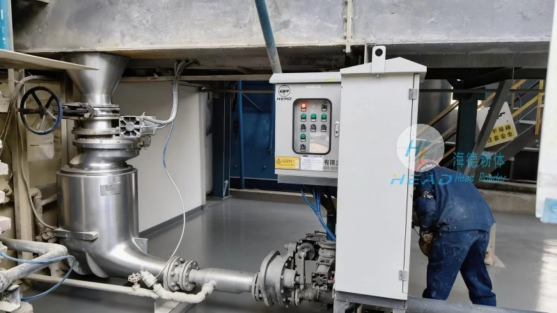 Sistema de transporte neumático para polvo de PTFE